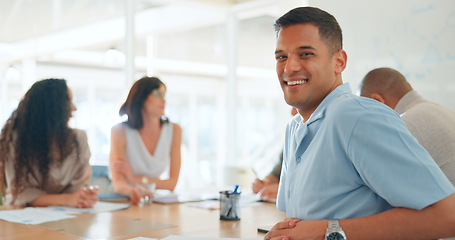 Image showing Meeting, conversation and portrait of businessman in office for working on a creative project in collaboration. Teamwork, diversity and face of male designer with colleagues for planning in workplace