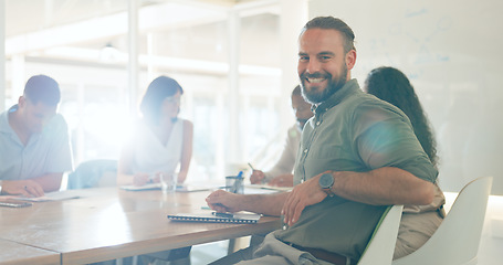 Image showing Meeting, discussion and portrait of businessman in office for working on a creative project in collaboration. Teamwork, diversity and face of male designer with colleagues for planning in workplace.