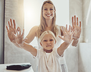 Image showing Clean family, smile and washing hands in bathroom, hygiene and sanitary with soap foam. Happy woman and child, portrait and palm for health and protection from germs, bacteria and virus in dirt