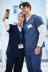 Image showing Happiness, people and selfie of team doctors, nurses or surgeon smile, profile picture and hospital photography. Clinic partner, medical teamwork and medicine expert post friends to social media app