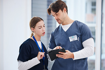 Image showing Healthcare, doctor and nurse with tablet, discussion and schedule at hospital with teamwork. Medical professional, man and woman with digital app for telehealth, health insurance website and advice.