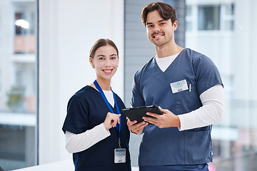 Image showing Portrait of doctors, man and woman with tablet in hospital with smile, healthcare and teamwork. Happy medical professional, nurse and surgeon with digital app for research, health insurance and pride