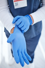 Image showing Gloves, hospital and hands of doctor for medicine, surgery and working in clinic for wellness. Healthcare, help and person with ppe for safety, protection and hygiene in medical service or procedure