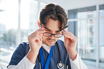 Image showing Optometry, glasses and man in clinic with frame, prescription lens and spectacles for eyesight. Healthcare, ophthalmology and face of doctor for eye care, vision and medical service for wellness