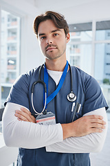 Image showing Hospital portrait, arms crossed and serious man, doctor or nurse with confidence, pride and medical expertise. Healthcare, medicine clinic trust and professional medic for cardiology support help