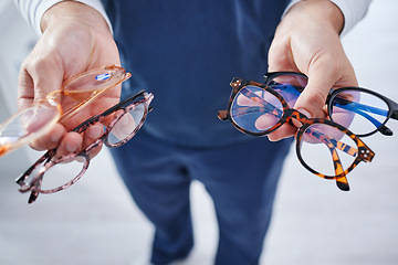 Image showing Optometry, glasses and hands of person with option for frame, prescription lens and spectacles for sight. Healthcare, ophthalmology and optician with decision for eye care, vision and medical clinic