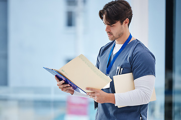 Image showing Hospital folder, doctor and man reading documents, healthcare records or clinic information. Wellness services, medical research and professional nurse, surgeon or expert check paperwork portfolio
