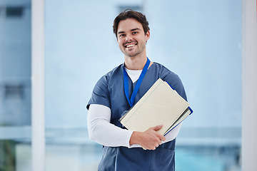 Image showing Doctor, arms crossed and portrait of happy man with notebook, healthcare records or clinic info for study test. Surgeon internship, medical education and student nurse confident for medicine research