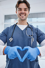 Image showing Portrait, hospital and hands in heart of doctor for medicine, surgery and working in clinic for wellness. Healthcare, emoji and man with hand sign for safety, insurance or support for medical service