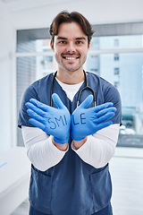 Image showing Doctor, portrait and gloves with smile in hospital, medicine and communication for healthcare in hands. Man, nurse and face in welcome gesture to surgery, patient help and consulting clinic in trust