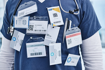 Image showing Close up, doctor and name tag with stethoscope, career and medical hospital. Healthcare, service professional and work for wellness, scrubs and worker for employee, surgeon and medicare practitioner