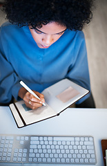 Image showing Woman with notebook, writing and checking schedule, agenda and reminder for office administration. Calendar, diary or journal, girl at desk planning notes for time management productivity from above.