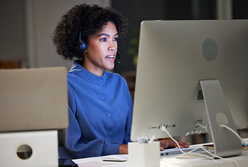 Image showing Computer, call center and night business woman typing customer service report, telemarketing and help desk advice. Overtime tech support, communication and advisory agent working on ecommerce sales