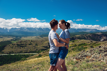 Image showing Loving couple together on mountain