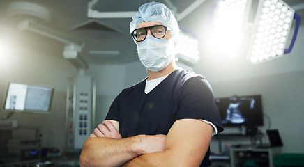 Image showing Man, portrait and surgery in operating room confident healthcare, professional or expert help. Male person, face mask or hospital theatre lights or medicine support, doctor or emergency care service