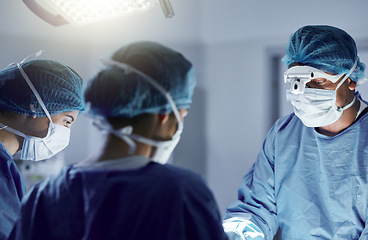 Image showing Surgery, team and mask on face with glasses for medical, healthcare and working in operation room. Surgeon, teamwork and people in hospital or clinic for healing, treatment or kidney transplant