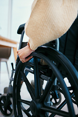 Image showing Hand, wheelchair and patient with a disability closeup in a home for recovery or mobility from the back. Healthcare, medical and injury with a person in a hospital or clinic for rehabilitation