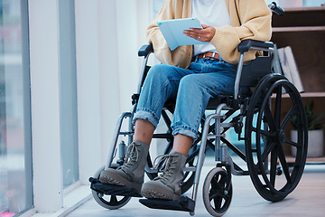 Image showing Inclusion, tablet and a person in a wheelchair at the office for communication, planning or the internet. Sitting, online and an employee with a disability, typing and technology for digital work