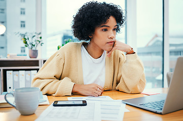 Image showing Woman with laptop, thinking and reading in home office with documents, internet and research for freelance project. Remote work, web ideas and girl with computer, paperwork and checking online report