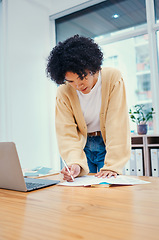 Image showing Woman with laptop, notes and research in office with admin, internet and creative ideas for freelance project. Remote work, paperwork and girl standing with computer, writing and document for agenda.