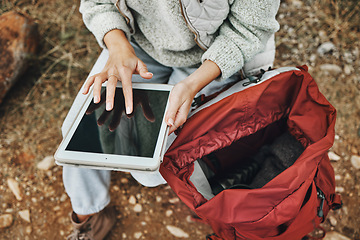 Image showing Hands, hiking and a person with a tablet in nature for gps location, search or online for travel. Above, internet and a tourist typing on technology for connection while trekking in the forest