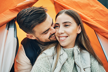 Image showing Happy couple, kiss and tent for camping, holiday or outdoor vacation together in affection, bonding or nature. Face of man kissing woman with smile on camp site for travel, love or trip in adventure