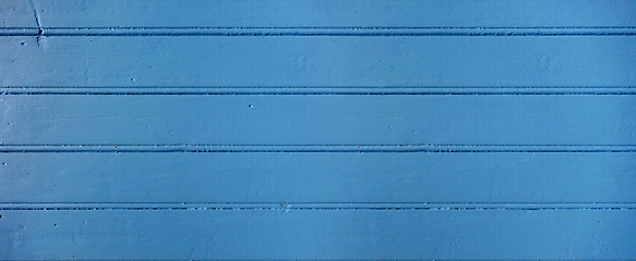 Image showing Old wood board painted blue. Banner background