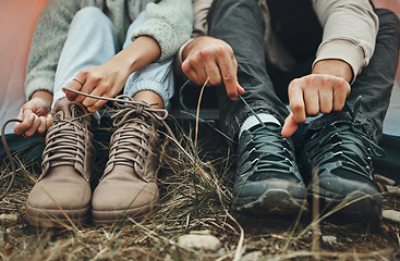 Image showing Shoes, people tie shoelace and hiking outdoor in nature park for travel and adventure, explore and zoom. Boots, camping with start or prepare for walk, trekking and journey with health and fitness