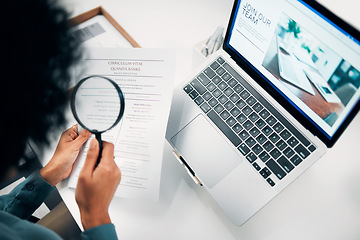 Image showing Magnifying glass, computer and woman reading cv in office for company recruitment website. Research, technology and closeup of female designer with hiring paperwork and laptop in workplace.