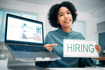 Image showing Woman, pointing and hiring sign, laptop and human resources with offer, recruitment and job opportunity. Onboarding, pc screen with website and HR invitation to join team, poster and recruiting