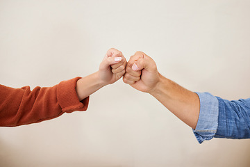 Image showing Fist bump, partnership and hands, people in a team with support, celebration and hello, success and solidarity. Synergy, cooperation and trust, agreement and deal with handshake and wall background