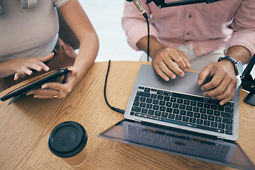 Image showing Radio presenter, communication and technology in studio for media company, talking on laptop and tablet. Man, woman or influencer on microphone in live stream of music, podcast and talk show speaker