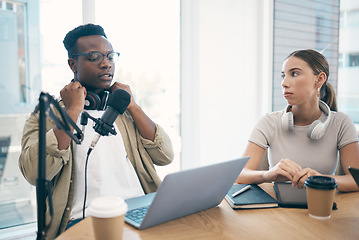 Image showing Man, podcast team and streaming live or online recording, creative conversation or microphone. Black male person, woman or laptop office for social network, influencer audience or content creating