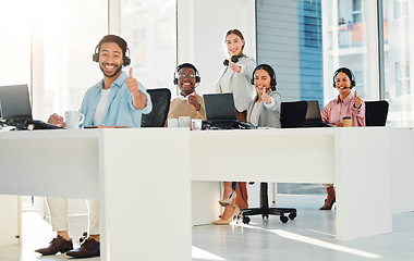 Image showing Call center staff, group and thumbs up in portrait with laptop, telemarketing and teamwork with voip tech. Help desk, people and customer service with contact us, emoji and feedback for consulting