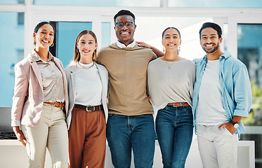 Image showing Portrait of confident business people with smile, hug and team at human resources office. Happy startup employees, men and women standing in workplace together with pride, solidarity and opportunity.