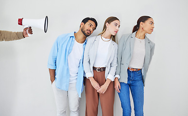 Image showing Megaphone, message and business people in studio to listen to a broadcast announcement on a white background. Loud, sound or noise for the communication of a news alert or information with a bullhorn