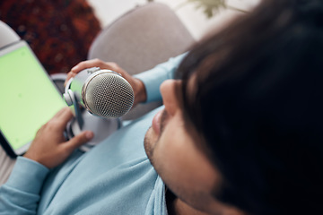 Image showing Man, microphone and green screen or tablet streaming for live audience, influencer or record. Male person, closeup or communication technology or speaker content creator, interview or voice for audio