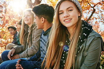 Image showing Teenager, group and portrait in park, girl and diversity on holiday, nature and relax by trees. Youth culture, happy friends and gen z school kids in sunshine, woods or garden for vacation in Canada