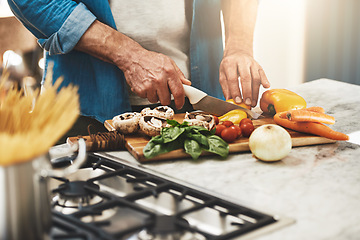 Image showing Cooking, hands and man cutting vegetables in the kitchen for diet, healthy or nutrition dinner. Recipe, closeup and mature male person from Canada chop ingredients for a supper or lunch meal at home.