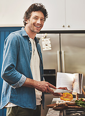 Image showing Happy, portrait and man chop vegetables in the kitchen for diet, healthy or nutrition dinner. Smile cooking and mature male person from Canada cutting ingredients for a supper or lunch meal at home.