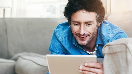 Image showing Man, relax and tablet internet on couch for digital contact, social media or movie app. Male person, streaming film and online shop connection or connectivity fun for comfort, weekend joy on sofa