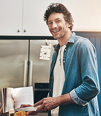 Image showing Smile, portrait and man cutting vegetables in the kitchen for diet, healthy or nutrition dinner. Happy, cooking and male person from Canada chop ingredients for a supper or lunch meal at home.