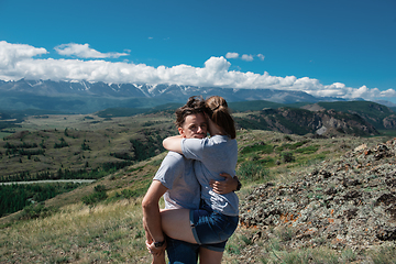 Image showing Loving couple together on mountain