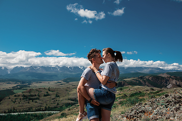 Image showing Loving couple together on mountain