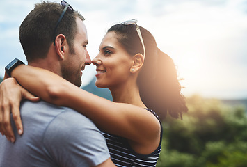 Image showing Trust, love or happy couple hug in park for date, support or care in nature with peace, bond or freedom. Eye contact, romantic man or woman on outdoor holiday vacation together to relax or travel