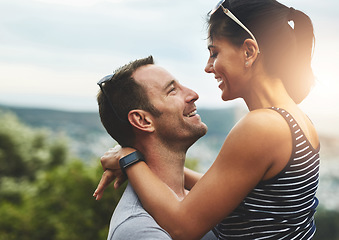 Image showing Excited, love or happy couple hug in park for date or care in nature with support, bond or summer. Eye contact, romantic man or woman on fun holiday vacation together to celebrate, relax or travel