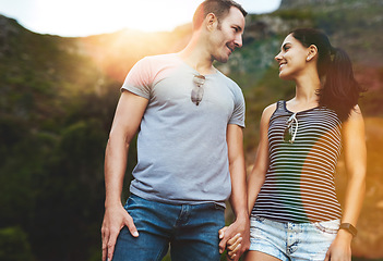 Image showing Nature, love or happy couple holding hands on date with wellness or care for romance or adventure. Peace, smile or man with happy woman on holiday vacation together for bond, support or relax in park