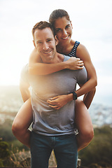 Image showing Portrait, piggy back and couple with hug, outdoor or lens flare with happiness, love or freedom. Face, man carrying woman or journey with embrace, smile or outside with wellness, adventure or holiday