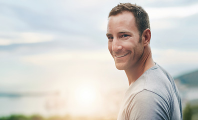 Image showing Smile, mockup and portrait of man in nature for hiking, fitness or cardio in the morning. Happy, space and an athlete or male runner training, doing exercise and watching the sunrise in the sky