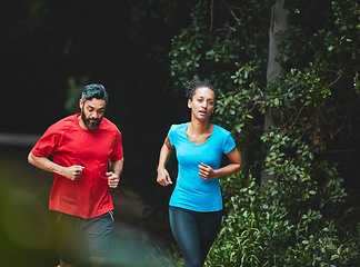 Image showing People, running in park for exercise and health outdoor, support and training for marathon with cardio. Runner, athlete and sport with couple in nature, challenge and fitness with workout for race